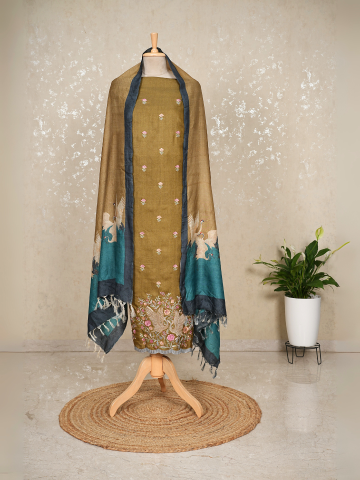 Tussar silk with intricate embroidery on shirt and swans printed on dupatta with pure crepe bottom